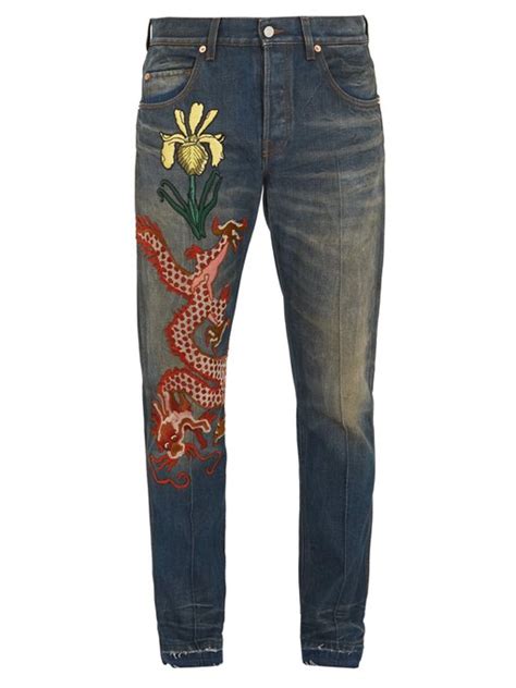 gucci dragon embroidered jeans